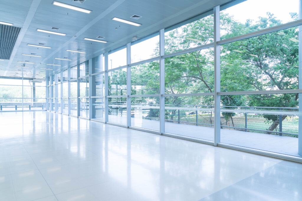 Smart glass windows in an office building are a sustainable construction material