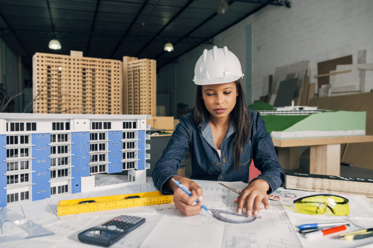 A woman plans out her strong brand identity for her construction company