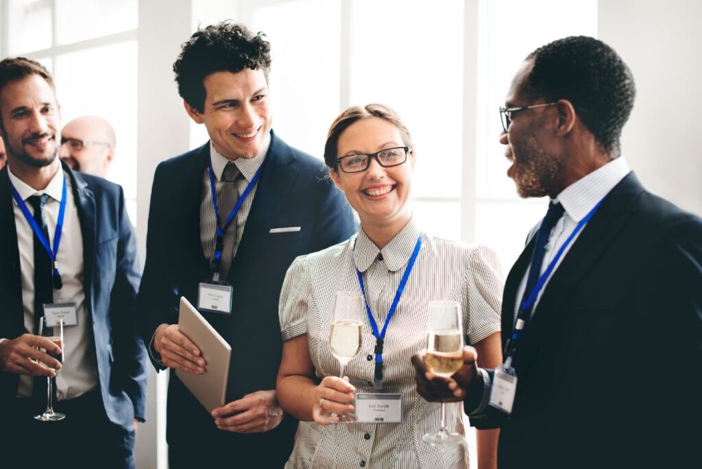 a group of people attend a networking event in the construction industry